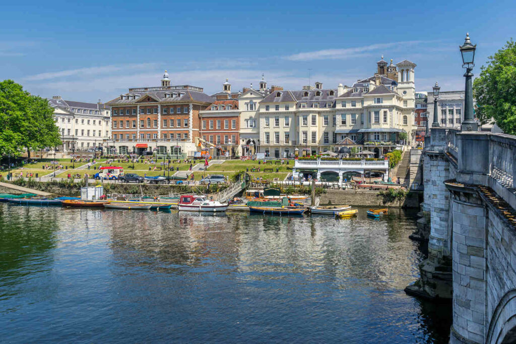 river thames riverside richmond bridge boats and people